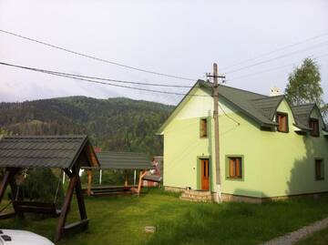 Фото номера Дом с 7 комнатами Дома для отпуска Goryanka Hotel г. Микуличин 48