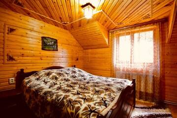 Фото номера Дом с 7 комнатами Дома для отпуска Goryanka Hotel г. Микуличин 58