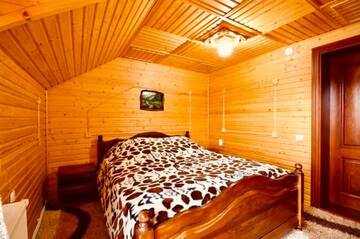 Фото номера Дом с 7 комнатами Дома для отпуска Goryanka Hotel г. Микуличин 59