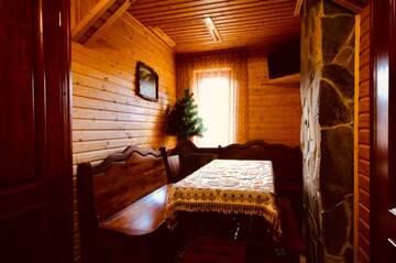 Фото номера Дом с 7 комнатами Дома для отпуска Goryanka Hotel г. Микуличин 57