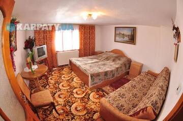 Фото номера Дом с 4 спальнями Лоджи Guest House Pid Lypamy г. Микуличин 10