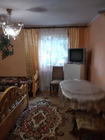 Фото номера Двухместный номер с двуспальной кроватью и дополнительной кроватью Лоджи Guest House Pid Lypamy г. Микуличин 4