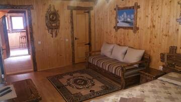 Фото номера Коттедж с 3 спальнями Дома для отпуска Зарінок карпат г. Микуличин 20