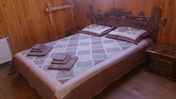Фото номера Коттедж с 3 спальнями Дома для отпуска Зарінок карпат г. Микуличин 28