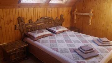 Фото номера Коттедж с 3 спальнями Дома для отпуска Зарінок карпат г. Микуличин 29