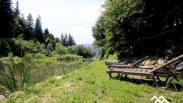 Фото номера Коттедж с 3 спальнями Дома для отпуска Зарінок карпат г. Микуличин 81