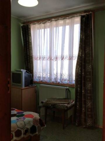 Фото номера Двухместный номер Делюкс с 1 кроватью Гостевой дом Комфортні номери г. Микуличин 4