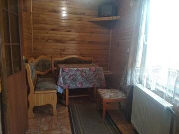 Фото номера Стандартный двухместный номер с 1 кроватью и общей ванной комнатой Загородные дома Перлина Карпат Котедж з каміном г. Микуличин 2