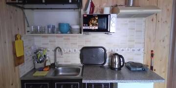 Фото номера Апартаменты с 2 спальнями Апартаменты Апартаменти "У Кузьмича" 2 г. Микуличин 45
