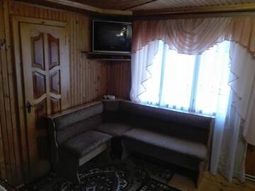 Фото номера Дом с 4 спальнями Апартаменты Садиба «Між Гір» г. Микуличин 32